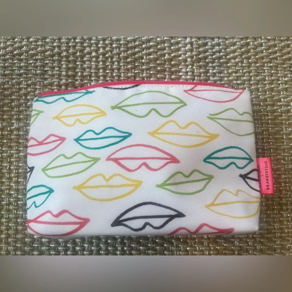 Clinique cosmetic makeup collection - bag, mascara, eyeliner, and makeup remover
